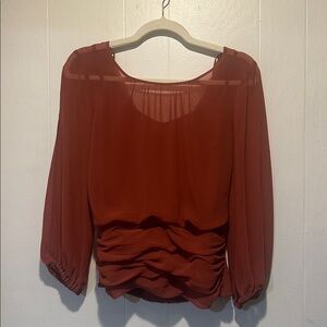 White House Black Market sheer rust colored blouse size 6